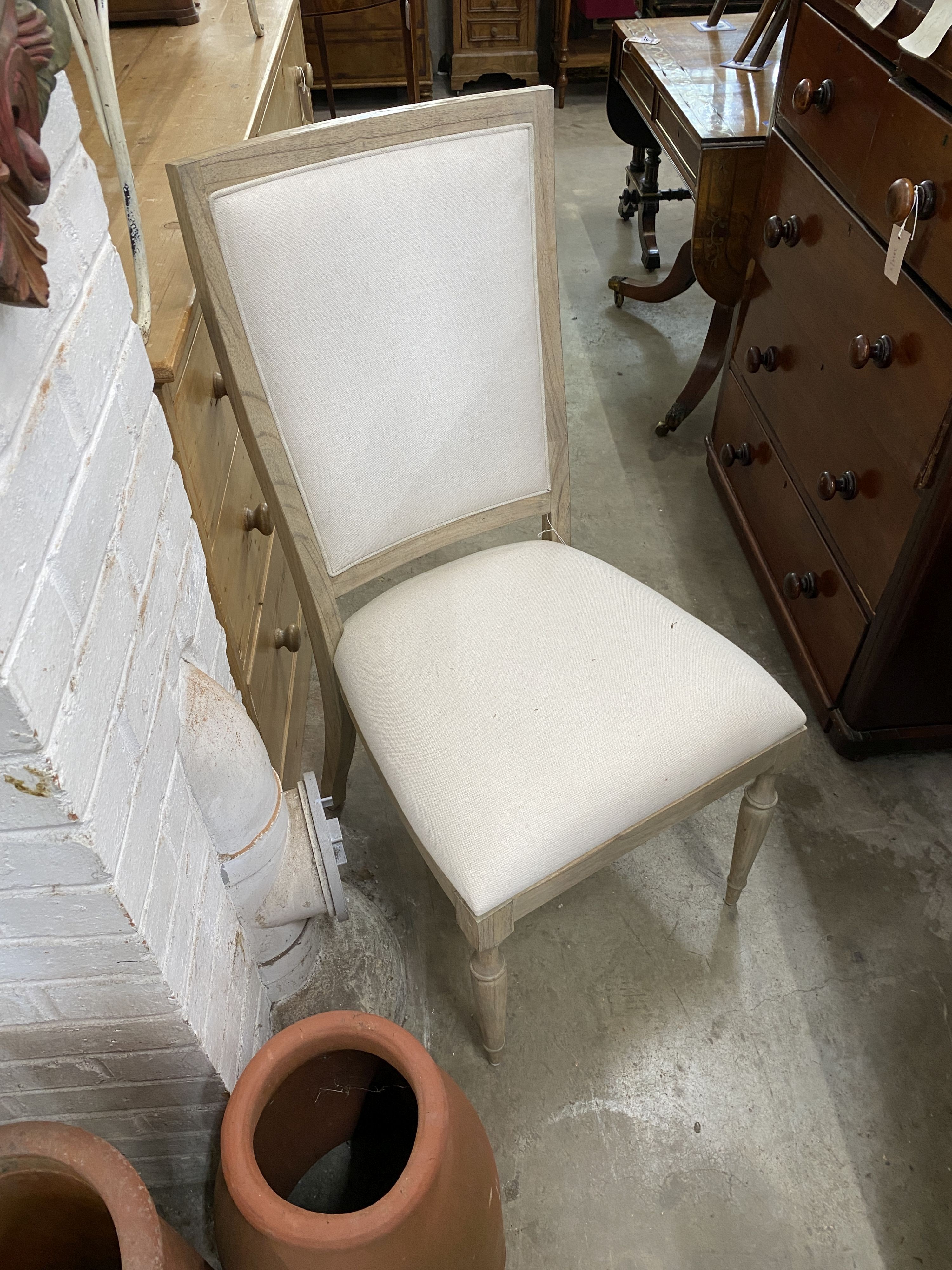 A pair of contemporary bleached oak “Riviera” upholstered high back dining chairs